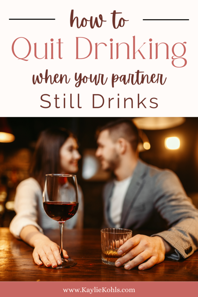 how to quit drinking when your partner still drinks title.  a woman holding a wine glass and man holding whiskey glass, sitting at a bar